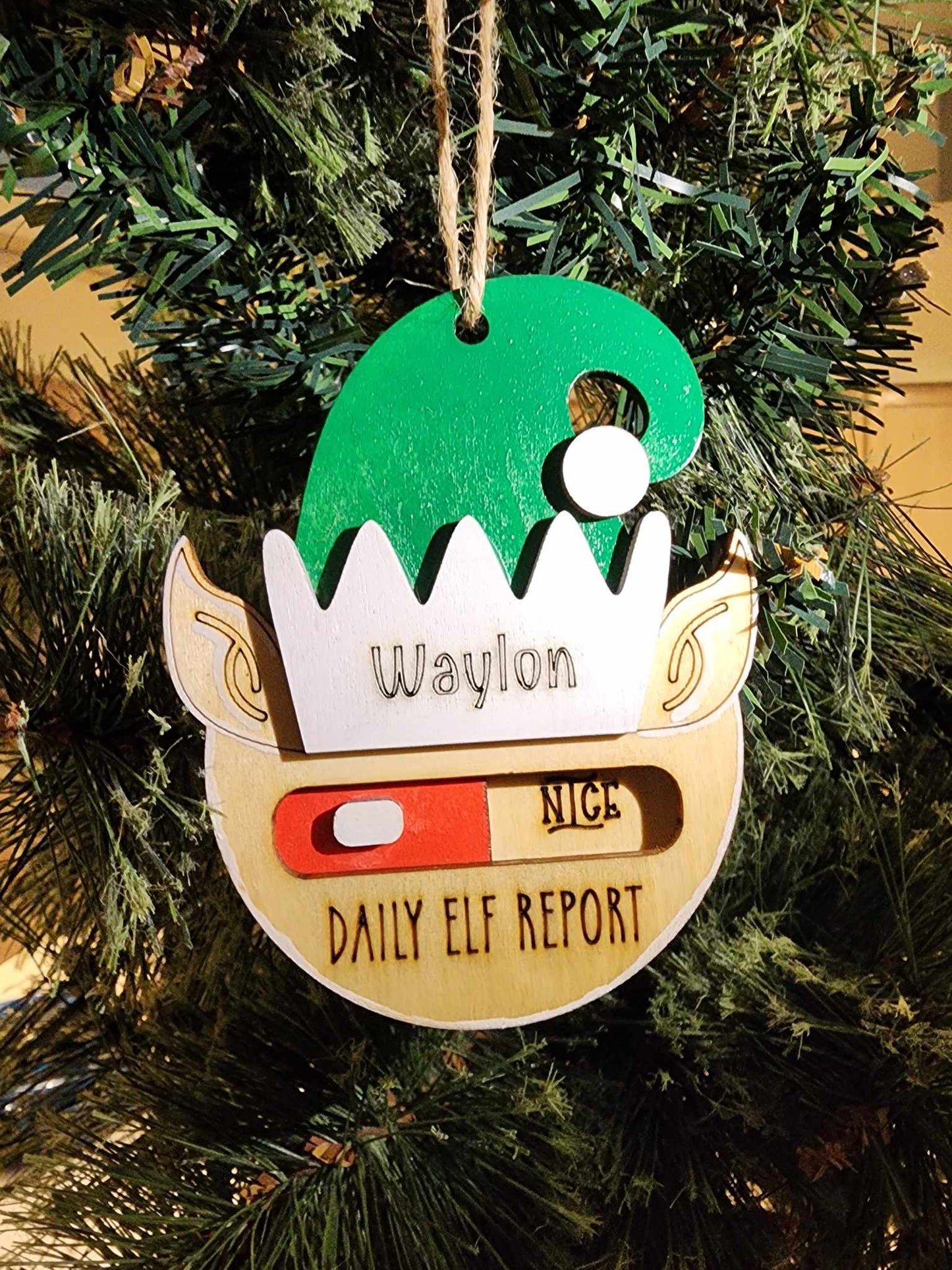 Daily elf report ornament, toggles between naughty and nice